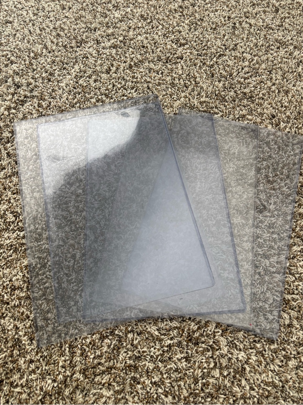 Assortment of Clear Plastic Poster Holders